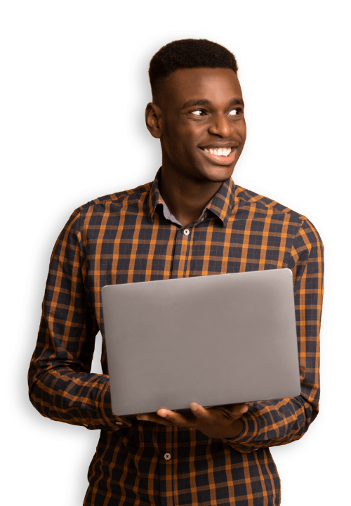 smiling man with laptop