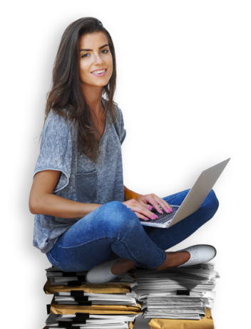 girl sitting on books with laptop