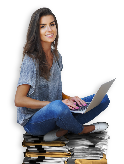 girl sitting with books and pc