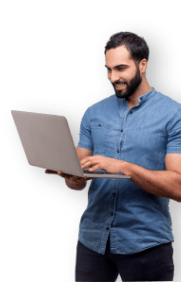 smiling man with laptop