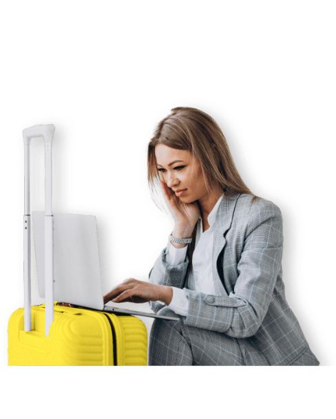 woman with suitcase and laptop