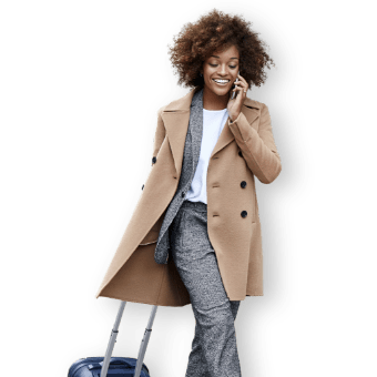 Smiling woman with luggage