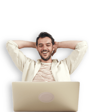 smiling man with laptop