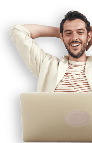 smiling man with laptop